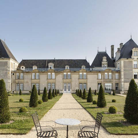 Wander about the French gardens and continue towards the forests or orchard