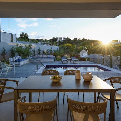 Enjoy a night full of cocktails and home-cooked souvlaki on your terrace