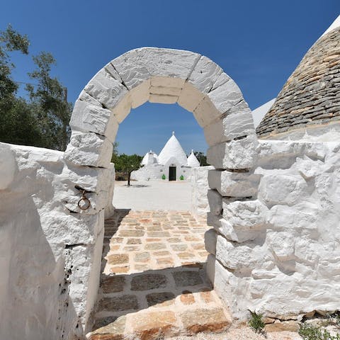 Wander the expansive grounds and marvel at the traditional Trulli design