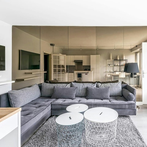 Put your feet up on the large sofa after a busy day