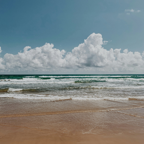 Stretch out on the beach, a short walk away