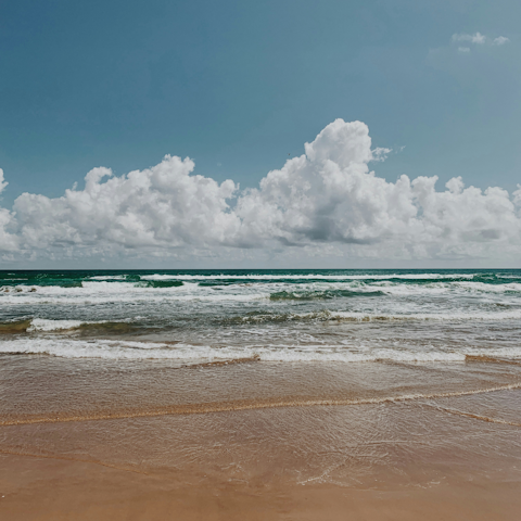 Stretch out on the beach, a short walk away