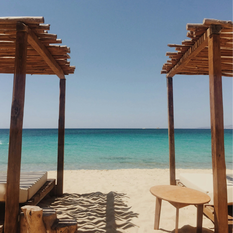 Sprawl out on Plaka Beach, a four-minute walk away