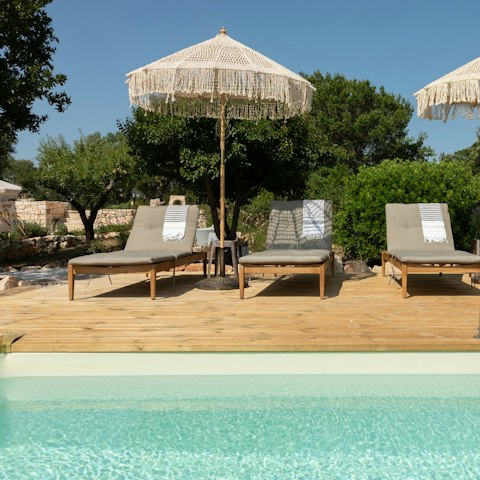 Spend your days poolside with a drink in hand