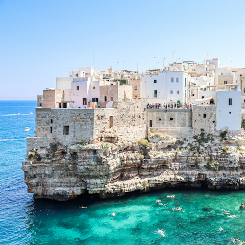 Spend the day in the sparkling seaside town of Polignano a Mare