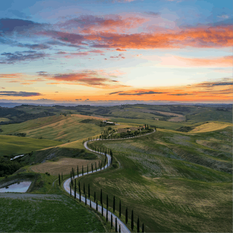 Set off on walking paths from the front door of this Tuscan home