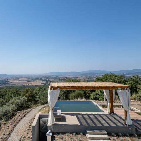 Admire stunning valley views from the pool