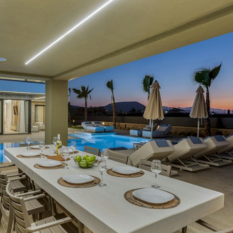 Watch the sun set over the hills at dinner
