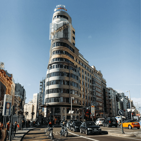 Go shopping along Gran Vía, a fifteen-minute walk away