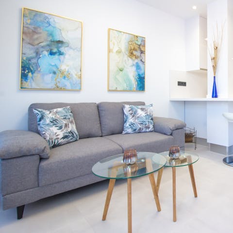 Stretch out in the living area after a day of exploring Gran Canaria
