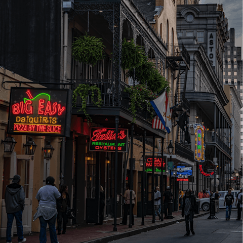 Follow the buzz of neon signs and live music to Bourbron Street, two minutes on foot