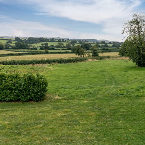 Wander around the seven acres of grounds and stumble upon landscaped gardens, orchards, and a pond