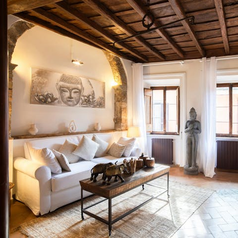 Admire the home's rustic touches like the wooden beams