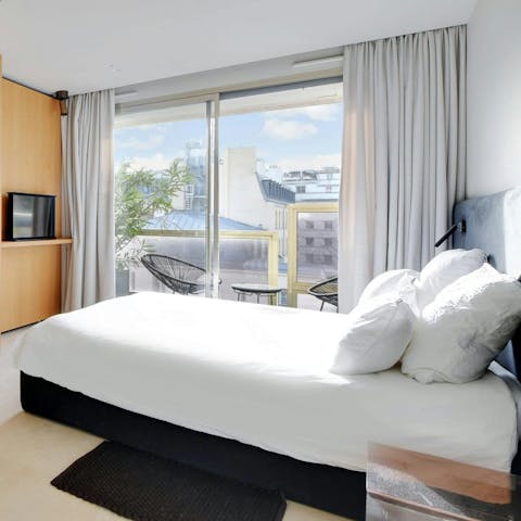 Wake up to Paris rooftop views