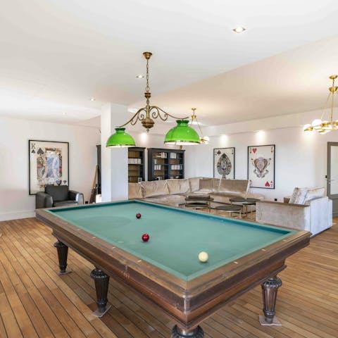 Shoot some snooker in the games room