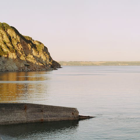 Watch the waves dance on the shoreline from the UNESCO harbour village of Charlestown
