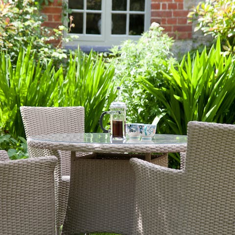 Sit out in the home's garden and listen to the sounds of the River Wylye flowing by