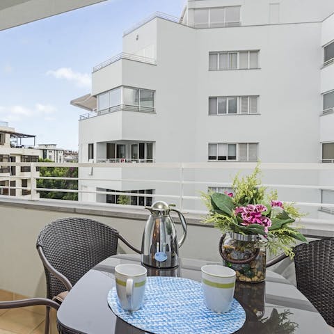 Enjoy a glass of Madeira on the balcony