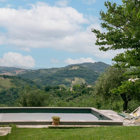 Admire sweeping views of the Valcona from the private pool