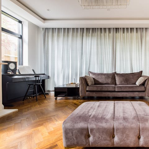 Treat guests to a rendition on the piano in the living room