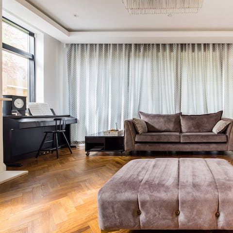 Treat guests to a rendition on the piano in the living room