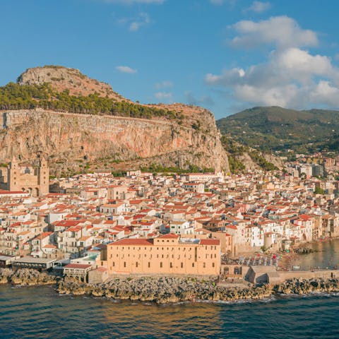 Wander around Cefalù, a ten-minute drive away