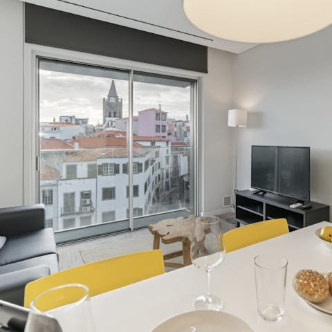 Perch by the slender Juliet balcony and admire the rooftops of the old town