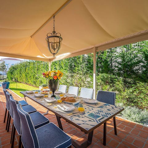 Enjoy local delicacies under the shaded veranda