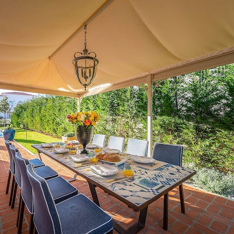 Enjoy local delicacies under the shaded veranda