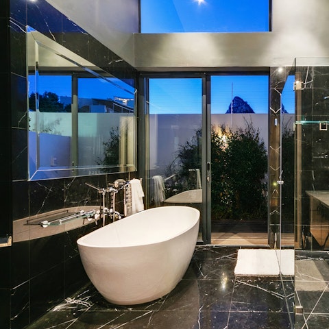 Soak in the bathtub after a day of sun and surf