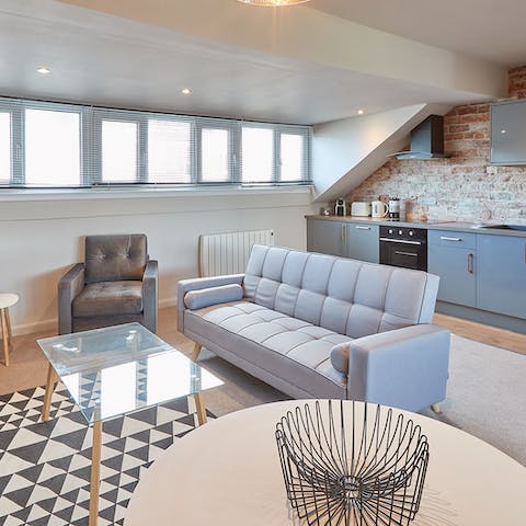 Kick back and relax on your sofa after a day of exploring, enjoying a nice glass of wine