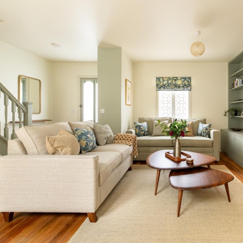 Gather for cosy evening games and drinks in the living room