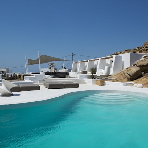 Plunge into the turquoise shared swimming pool, and cool down