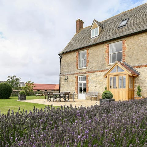 Admire the countryside views from the expansive garden