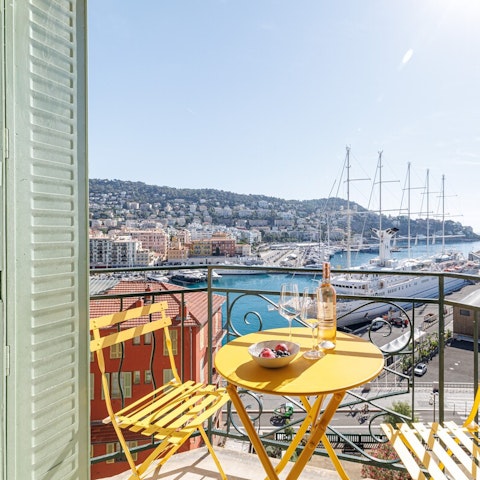Enjoy a front-row seat to harbour life from the balcony