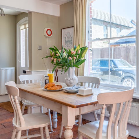 Start your morning with coffee and pastries in the sunny kitchen