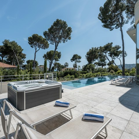 Soak in the hot tub or take a dip in the heated pool