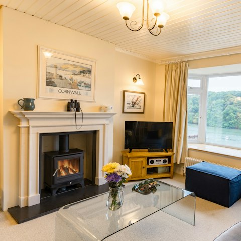 Gather in the living room for a cosy evening in front of the log burner in the living room