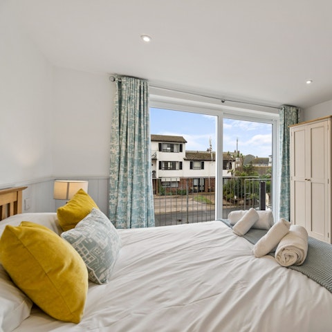 Slide open the glass doors of the master bedroom for access to the Juliette balcony