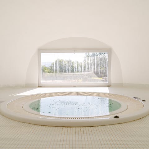 Luxuriate in the hot tub complete with a view of the local countryside