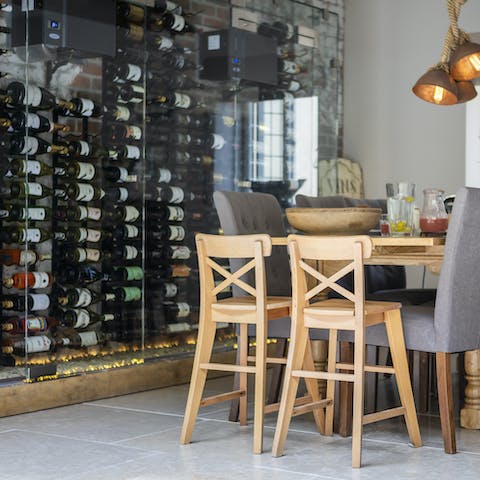 Visit a local vineyard and store at the optimum temperature in the wine cooler