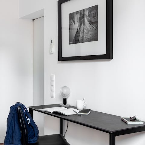 Work remotely from the designated desk area