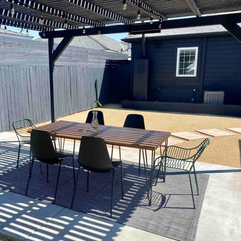 Rustle up home-cooked meals to enjoy outdoors together under the pergola