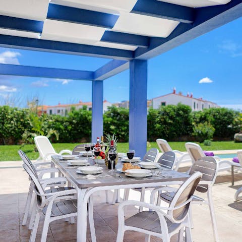 Serve up some Menorcan culinary delights at the alfresco dining area