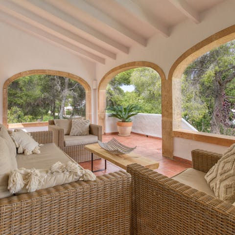 Relax with a book in the outdoor lounge area