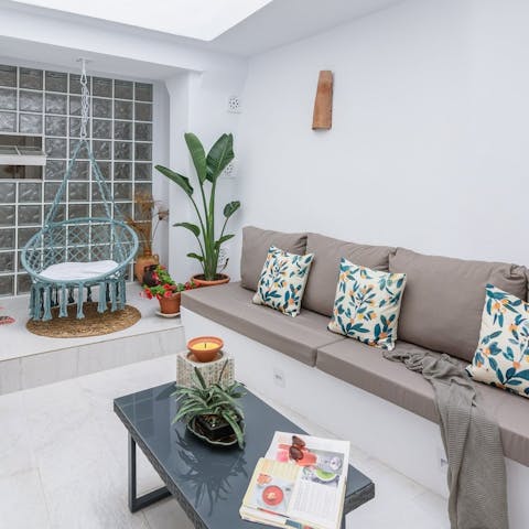 Settle down with a good book in your peaceful interior patio