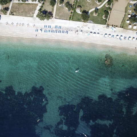Bask in the glorious sunshine as you sunbathe on Krouzeri Beach, minutes away