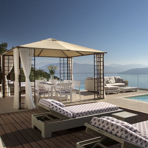 Prepare platters of salty olives, fresh bread and feta cheese to enjoy under the gazebo