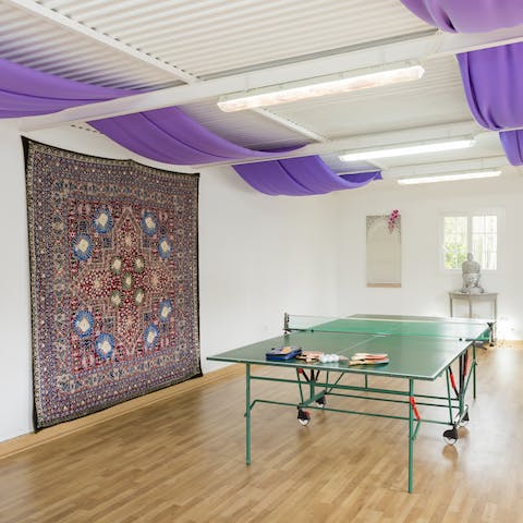 Take on a challenger at a game of table tennis in the yoga studio