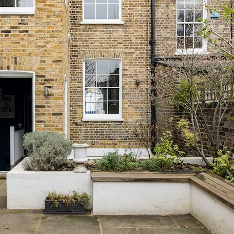 Sip a cup of coffee or glass of wine in your south-facing garden